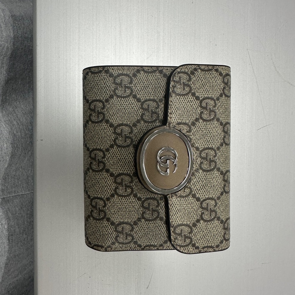 Gucci Beige Monogram Wallet with Silver Clasp